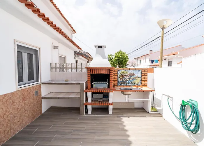 With Garden And Barbecue